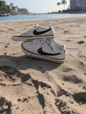 Nike White Court Legacy Sneakers with Black Swoosh and Brown Trim